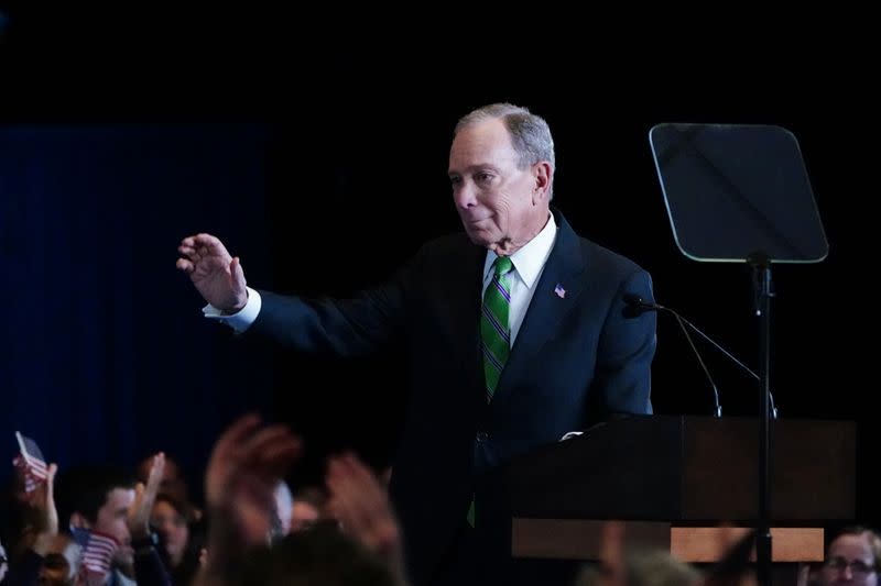 Former Democratic U.S. presidential candidate Mike Bloomberg waves to supporters after ending his campaign for president in New York