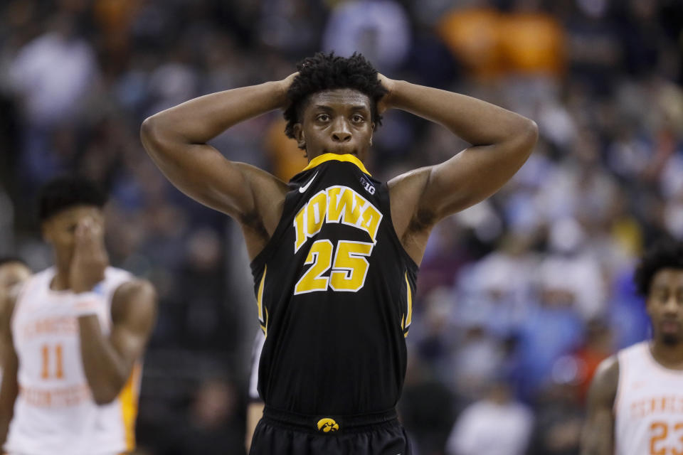 Iowa's Tyler Cook (25) reacts in overtime during a second-round men's college basketball game in the NCAA Tournament against Tennessee, Sunday, March 24, 2019, in Columbus, Ohio. (AP Photo/John Minchillo)