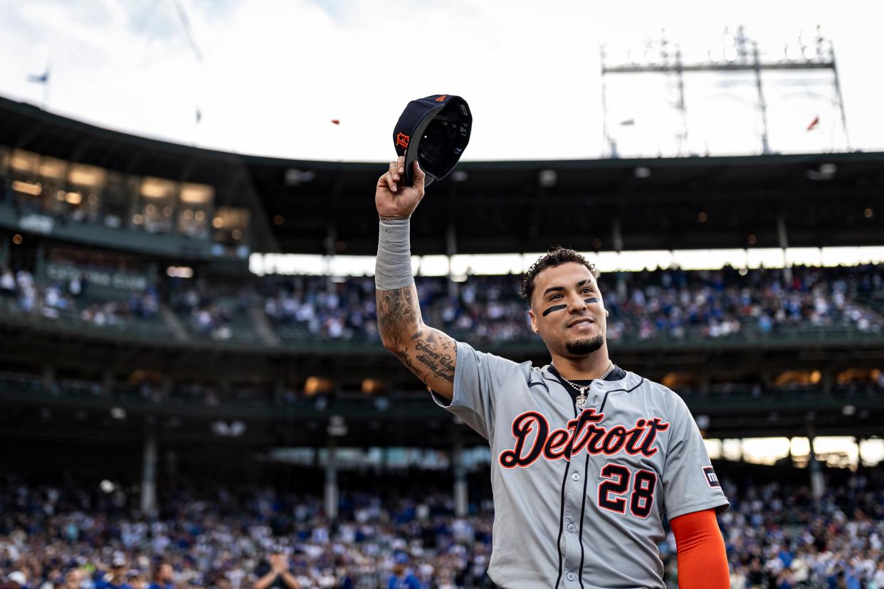 Javier Baez of the Detroit Tigers acknowledges the crowd on his return to Wrigley Field for the first time since his 2021 trade before a game against the Chicago Cubs on Tuesday, Aug. 20, 2024, in Chicago.