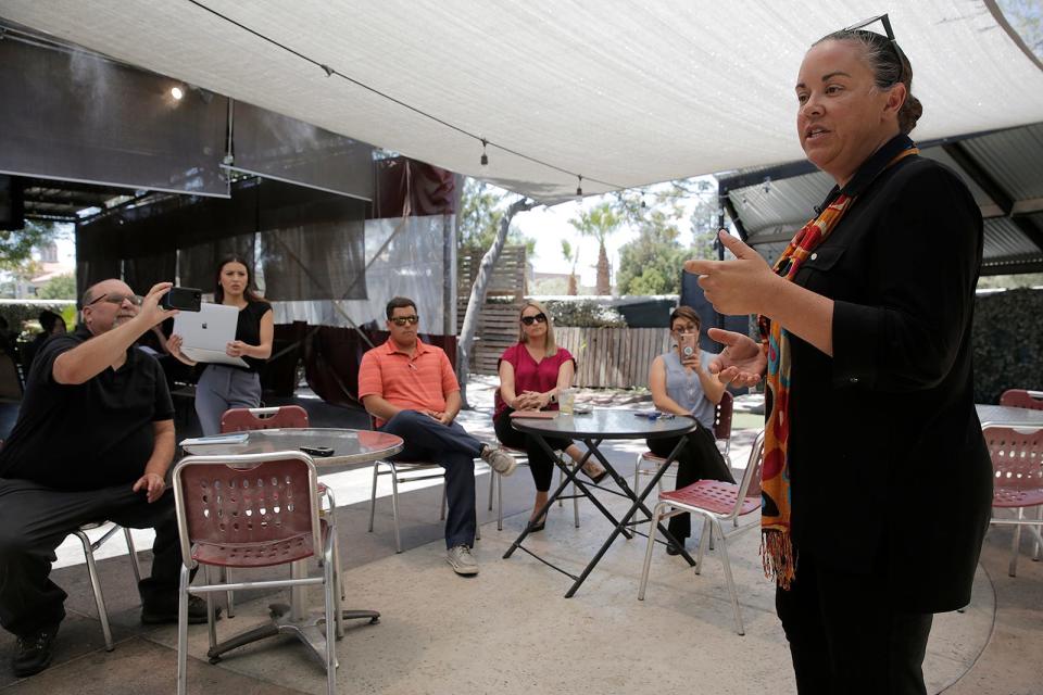 Marci Dickerson, right, addresses a reporter at a news conference on May 26, 2022. Dickerson and others slammed the Las Cruces City Council and the mayor for not doing more regarding property crime or homelessness.