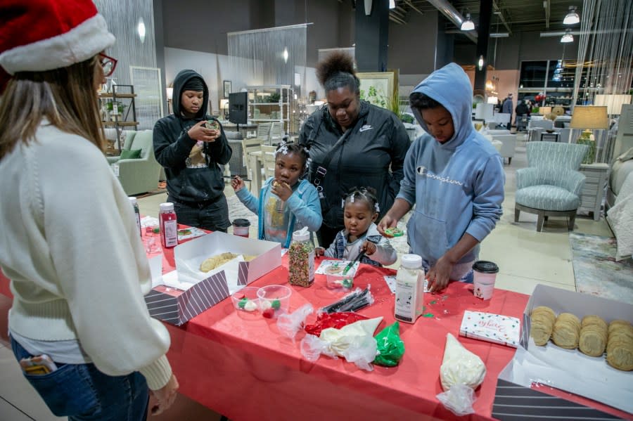 The Angel Tree Christmas Party at Talsma Furniture near Grand Rapids on Nov. 30, 2023. (Michael Buck/WOOD TV8)