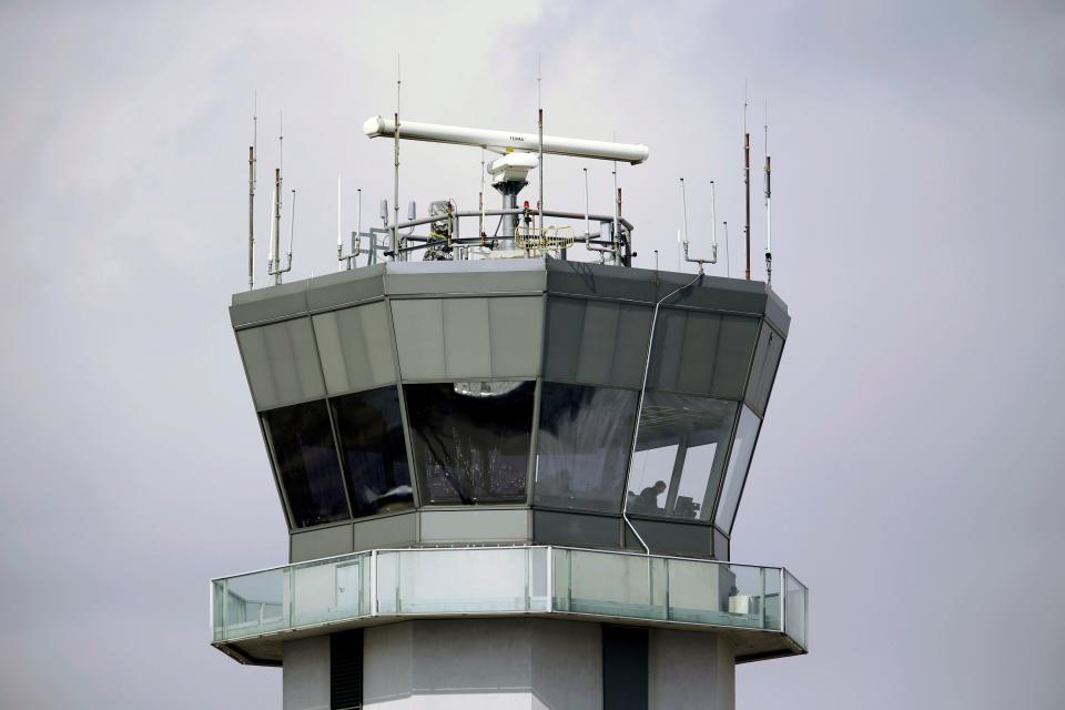This March 12, 2013 photo shows the air traffic control tower at Chicago's Midway International Airport.