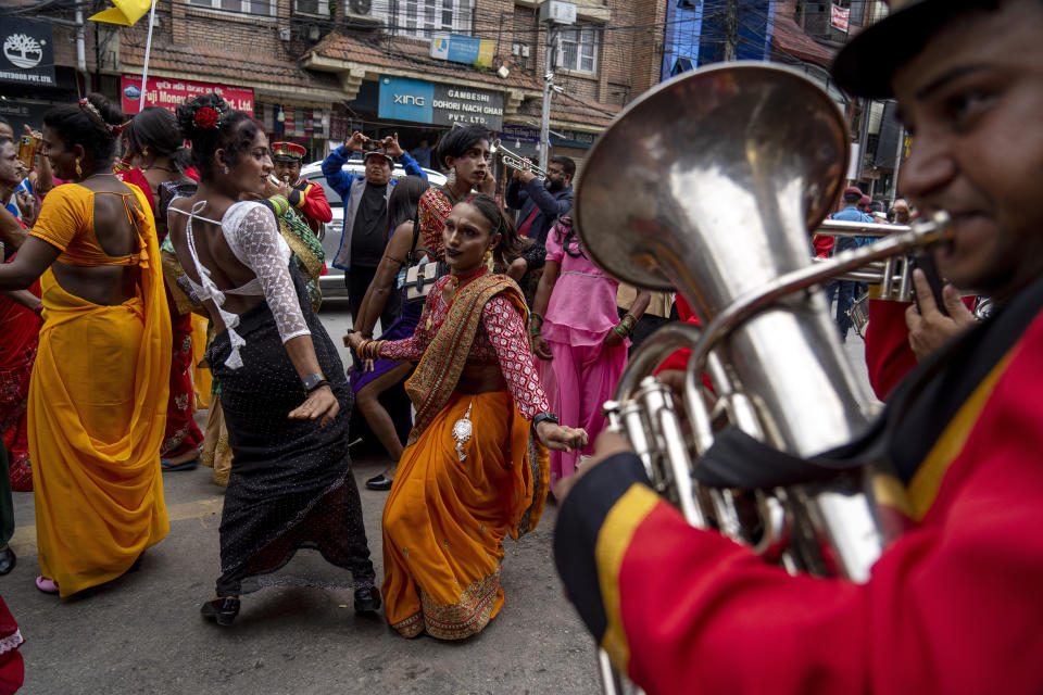 Samesex couples and LGBTQ+ activists rally in Nepal's capital during