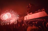 <p>Fireworks in Arromanches-les-Bains seen from the M4A2 Sherman Tank Monument during D-Day Festival Normandy 2017.<br> (Photo: Artur Widak/NurPhoto via Getty Images) </p>