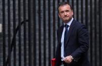 FILE PHOTO: Britain's Secretary of State for Wales Alun Cairns is seen outside Downing Street in London