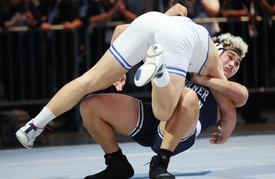 Leimania Fager, Corner Canyon, beats Trevon Gates, Pleasant Grove, in the 6A boys wrestling state championships at UVU in Orem on Saturday, Feb. 17, 2024. | Jeffrey D. Allred, Deseret News