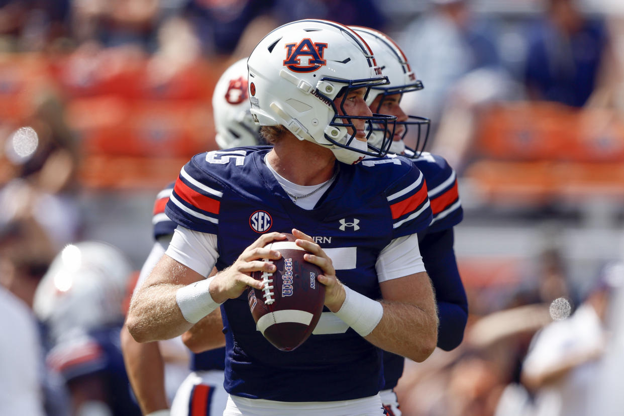 Auburn quarterback Hank Brown warms up before an NCAA college football game against Arkansas, Saturday, Sept. 21, 2024, in Auburn, Ala.(AP Photo/Butch Dill)