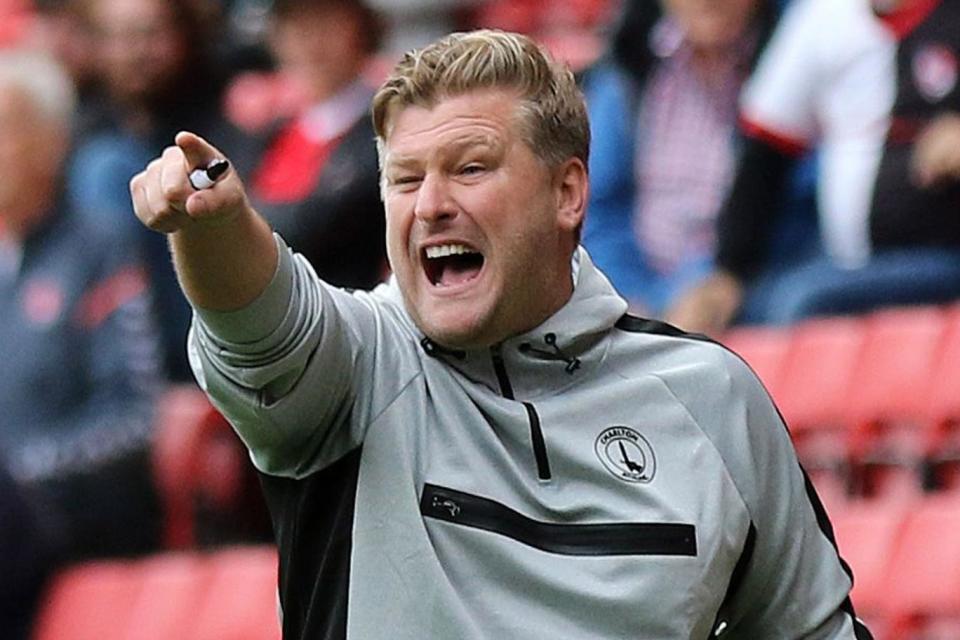 Karl Robinson has set his sights on promotion with Charlton sitting seventh in League One (Rex)