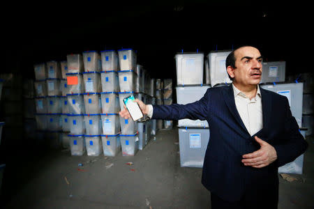 FILE PHOTO: Riyadh al-Badran, the head of Iraq's Independent Higher Election Commission, is seen after a fire at a storage site in Baghdad, housing the boxes from Iraq's May parliamentary election, Iraq June 10, 2018. REUTERS/Thaier Al-Sudani/File Photo