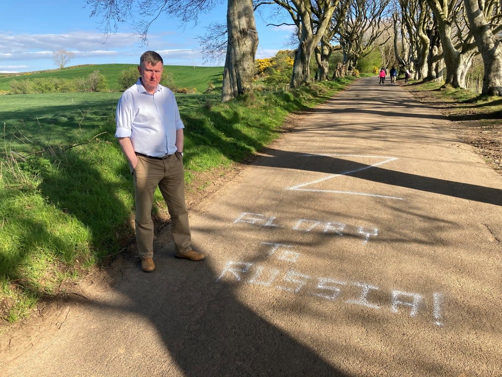 DUP North Antrim Assembly election candidate Mervyn Storey who has condemned pro-Russian graffiti which appeared on the road at the Dark Hedges in Co Antrim, a site made famous across the world after appearing in Game of Thrones. Issue date: Saturday April 23, 2022. (Handout/PA) (PA Media)