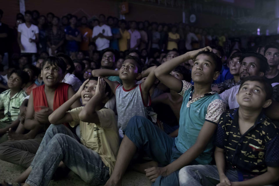 Brazil fans watch the defeat to Belgium