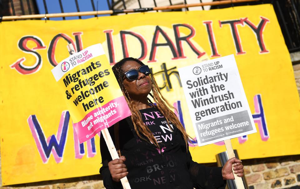 A woman gathers for a Windrush generation solidarity protest in Brixton, 20 April, 2018 (EPA-EFE)