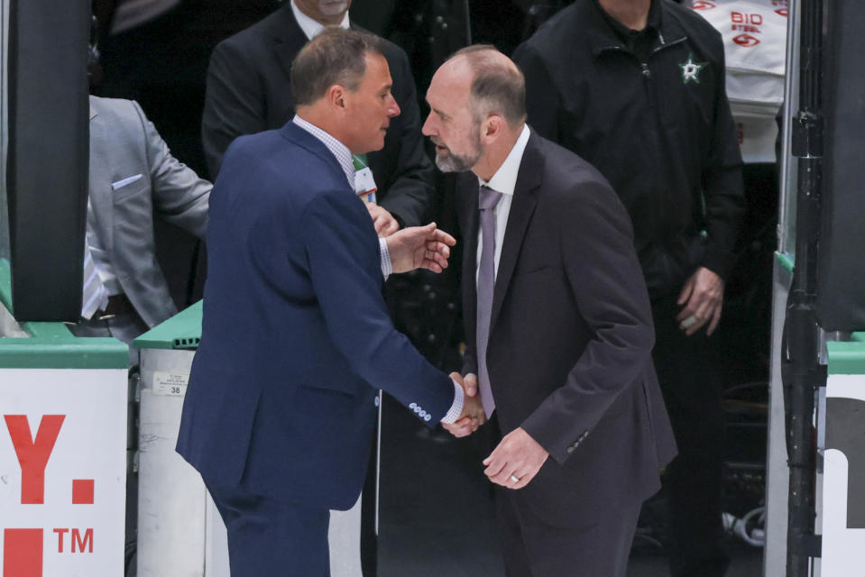 Vegas Golden Knights coach Bruce Cassidy, left, shakes hands with Dallas Stars coach Peter DeBoer after Game 6 of the NHL hockey Stanley Cup Western Conference finals Monday, May 29, 2023, in Dallas. (AP Photo/Gareth Patterson)