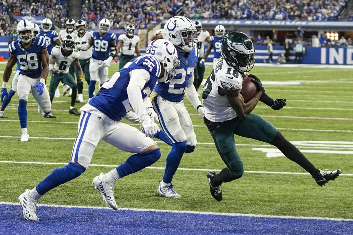 Philadelphia Eagles wide receiver Quez Watkins (16) runs in for a touchdown past Indianapolis Colts safety Rodney Thomas II (25) during an NFL football game in Indianapolis, Sunday, Nov. 20, 2022. The Eagles defeated the Colts 17-16. (AP Photo/Darron Cummings)