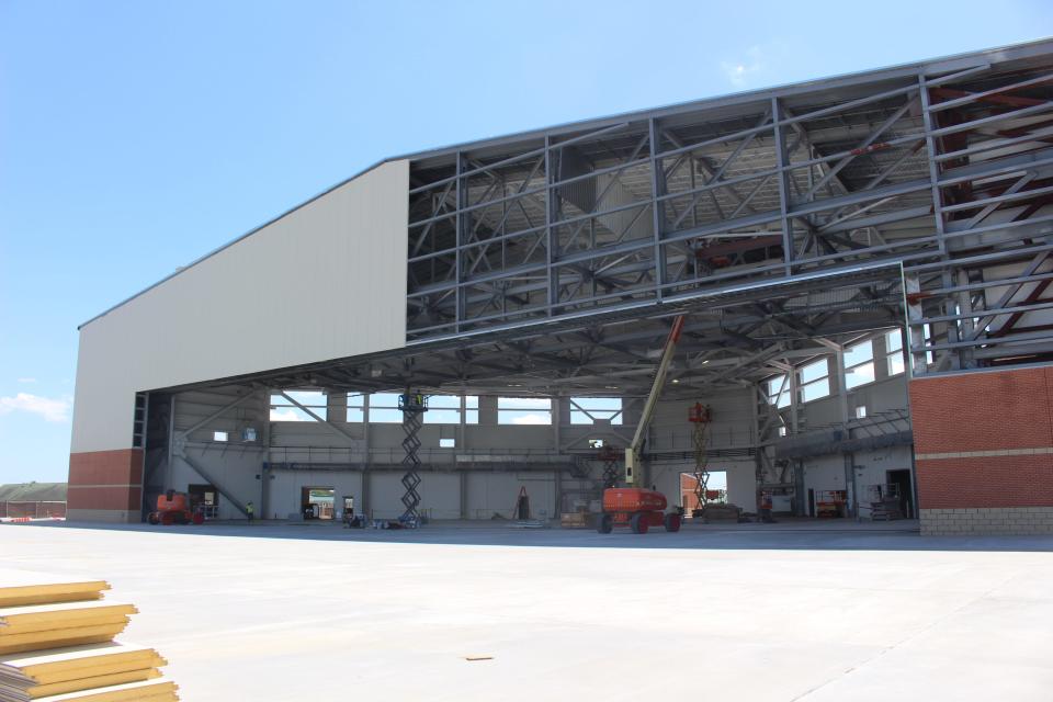 The $42 million hangar is still being constructed on the Savannah Air National Guard base as calls to shut down the training center are being made by the Biden administration.