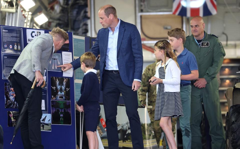 Prince of Wales, seen here with his children at RAF Fairford last summer, spent seven-and-a-half years in full-time military service