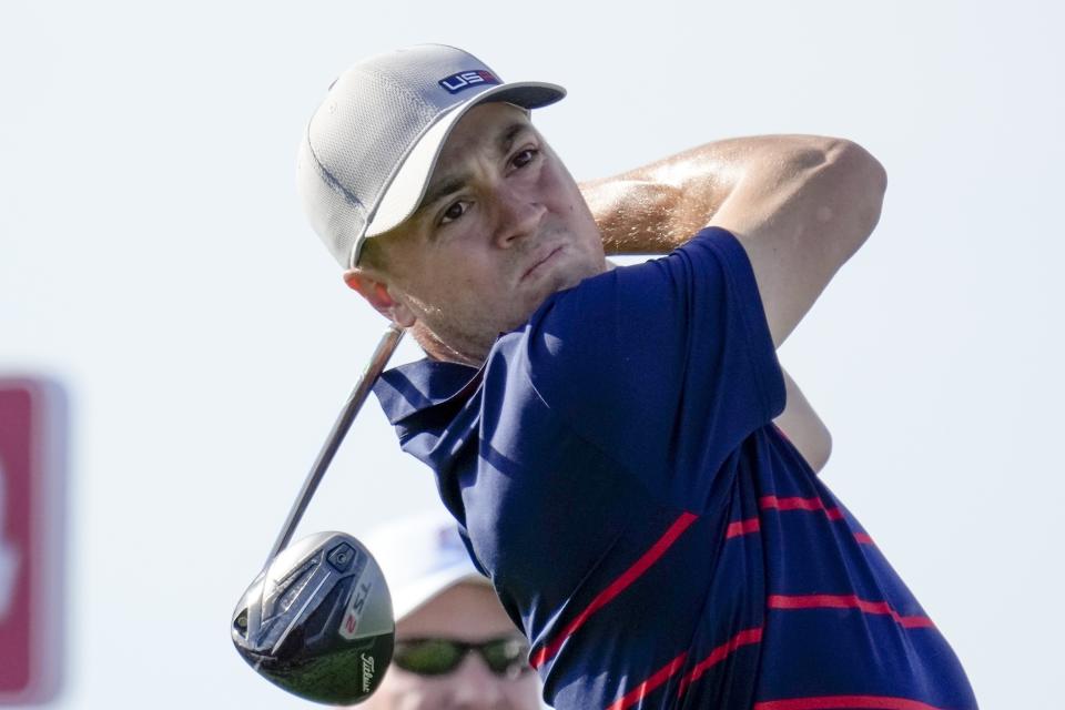 FILE - Team USA's Justin Thomas hits a drive on the 11th hole during a foursome match at the Ryder Cup at the Whistling Straits Golf Course Friday, Sept. 24, 2021, in Sheboygan, Wisc. Thomas says a potential rival league has made the PGA Tour think about how it can do better with compensating players. (AP Photo/Ashley Landis, File)