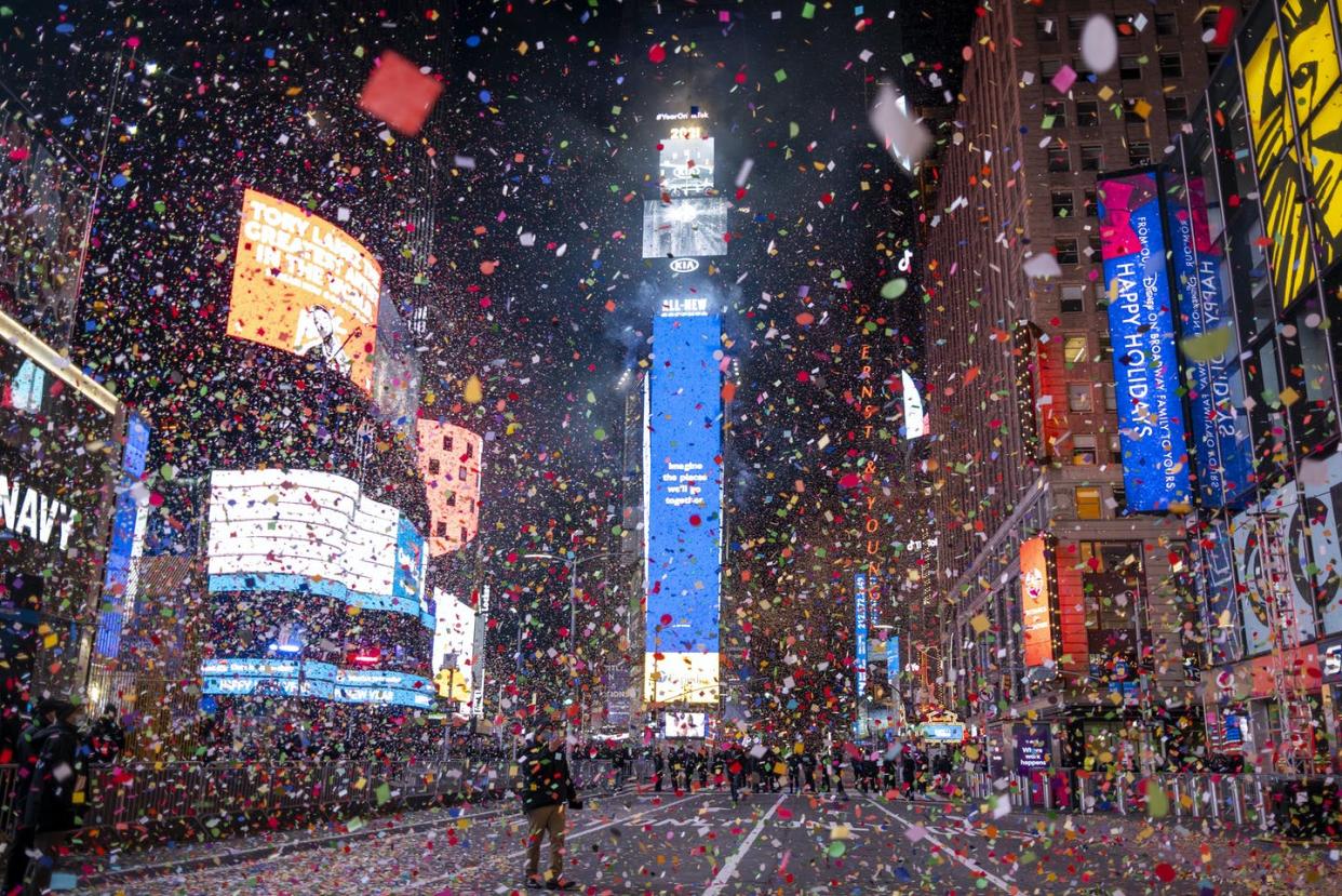 <span class="caption">Amid the pandemic, confetti fell on an almost-empty Times Square last New Year's Eve.</span> <span class="attribution"><a class="link " href="https://newsroom.ap.org/detail/APTOPIXVirusOutbreakNewYorkNewYears/3d26a53371bc4f179aa4a3587b9d1f92/photo?Query=%22times%20square%22%20ball%20%22new%20year%27s%22&mediaType=photo&sortBy=arrivaldatetime:desc&dateRange=Anytime&totalCount=325&currentItemNo=10" rel="nofollow noopener" target="_blank" data-ylk="slk:AP Photo/Craig Ruttle;elm:context_link;itc:0;sec:content-canvas">AP Photo/Craig Ruttle</a></span>