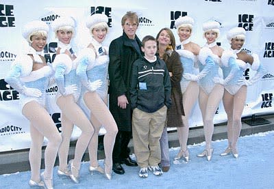 Denis Leary and family with Rockettes at the Radio City Music Hall premiere of Ice Age