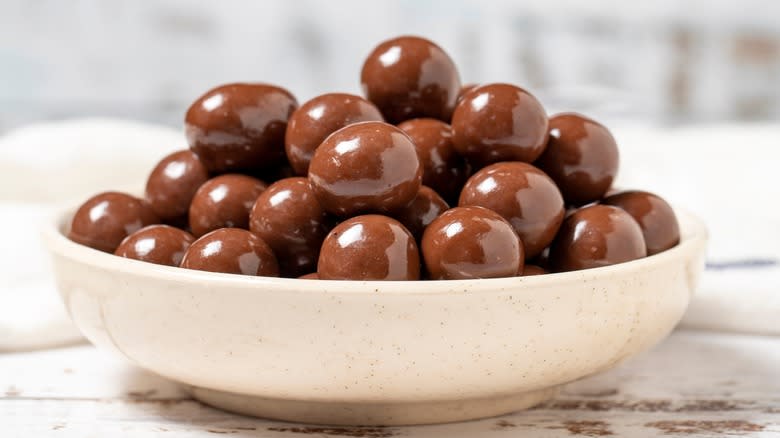 bowl of chocolate covered almonds