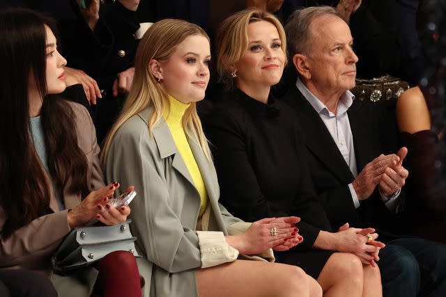 <p>EMMANUEL DUNAND/AFP via Getty </p> Like mother, like daughter! Reese Witherspoon and Ava Phillippe sit front row at the Fendi Haute Couture show