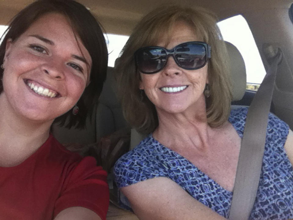 Kayla Mueller (L), 26, an American humanitarian worker from Prescott, Arizona is pictured with her mother Marsha Mueller in this undated handout photo obtained by Reuters February 6, 2015. The Islamic State militant group said February 6, 2015 that Kayla Mueller, who it claimed it held hostage in Syria, had been killed when Jordanian fighter jets hit a building where she was being held, according to the SITE monitoring group. Kayla Mueller was abducted in Aleppo, Syria in August 2013. REUTERS/Mueller Family/Handout via Reuters (UNITED STATES - Tags: POLITICS CONFLICT TPX IMAGES OF THE DAY) THIS IMAGE HAS BEEN SUPPLIED BY A THIRD PARTY. IT IS DISTRIBUTED, EXACTLY AS RECEIVED BY REUTERS, AS A SERVICE TO CLIENTS. FOR EDITORIAL USE ONLY. NOT FOR SALE FOR MARKETING OR ADVERTISING CAMPAIGNS. NO ARCHIVES. NO SALES