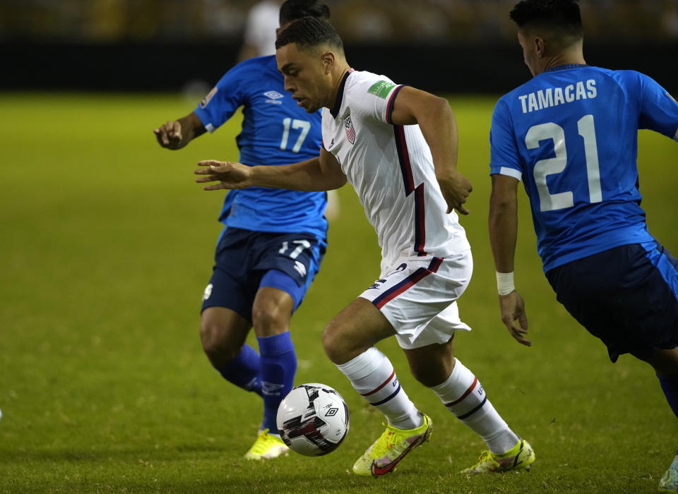 United States's Sergino Dest, center, controls the ball during a qualifying soccer match against El Salvador, for the FIFA World Cup Qatar 2022 at Cuscatlan stadium in San Salvador, El Salvador, Thursday, Sept. 2, 2021. (AP Photo/Moises Castillo)