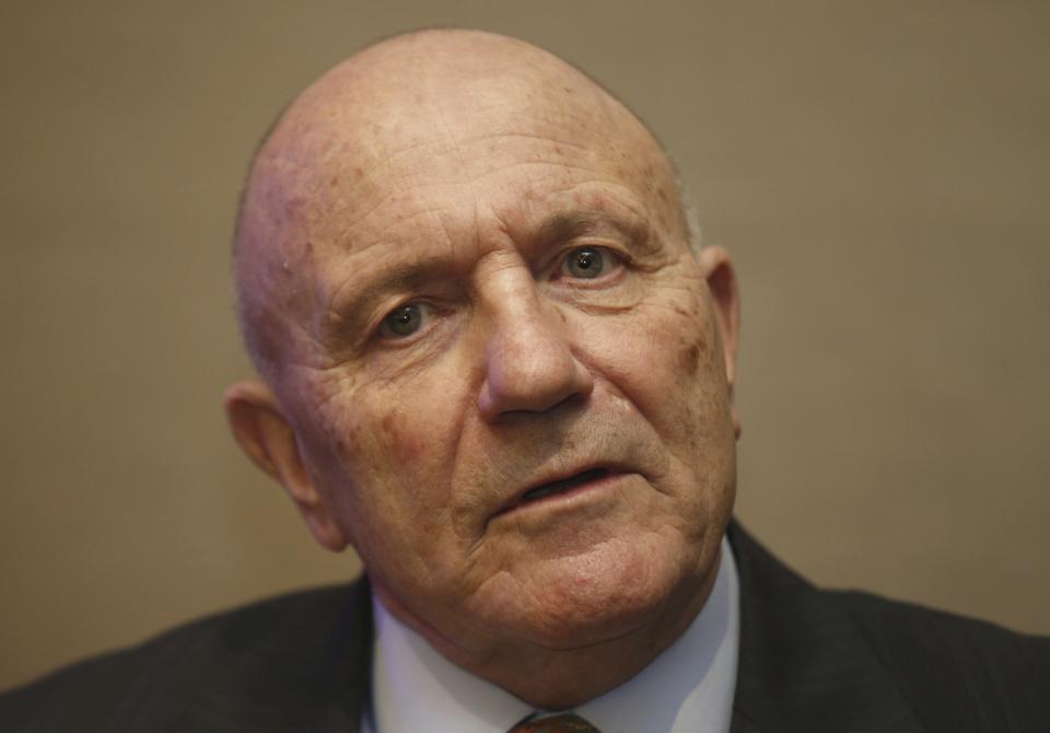 FILE - George Cohen, one of four members of the England 1966 World Cup winning side, talks to the media at the Royal garden Hotel in London Tuesday, Jan. 5, 2016. George Cohen, the right-back for England World Cup-winning team of 1966, has died aged 83, his former club Fulham have announced on Friday, Dec. 23, 2022. (AP Photo/Alastair Grant, File)