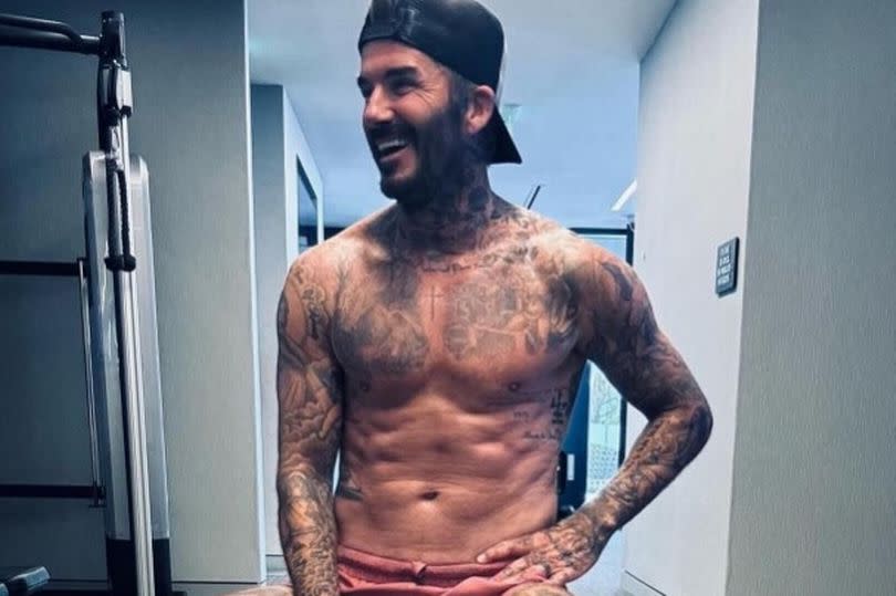 David Beckham shirtless in the gym