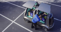 This undated image provided by The Kroger Co. shows an autonomous vehicle called the R1. Nuro and grocery chain Kroger are teaming up to bring unmanned delivery service to customers. The companies said Tuesday, Dec. 18, 2018, that Nuro's unmanned vehicle, the R1, will be added to a fleet of autonomous Prius vehicles that have run self-driving grocery delivery service in Scottsdale, Ariz., with vehicle operators since August. (The Kroger Co. via AP)