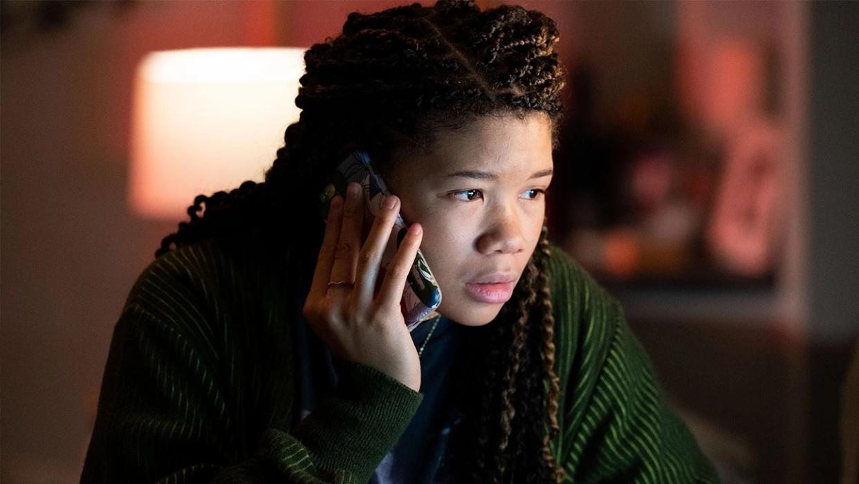  Storm Reid holds phone to ear in movie still 