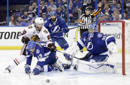 Chicago put two pucks past Ben Bishop in Game 5 as the Bolts starter battled through injury. (AP)