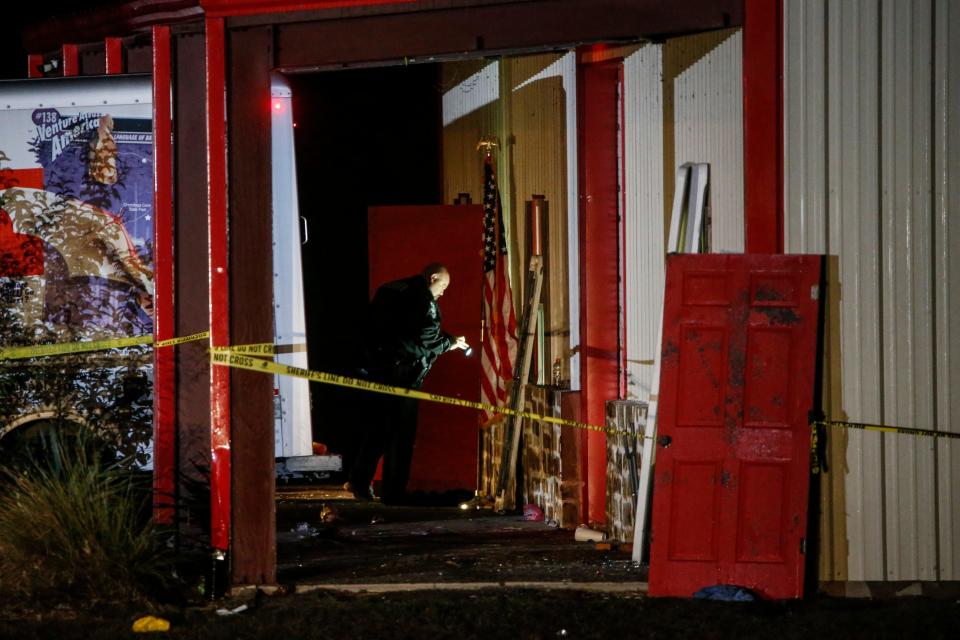 Authorities work the scene after a deadly shooting in Greenville, Texas, on Sunday, Oct. 27, 2019.