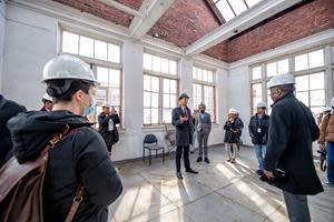 Executive Director of Campus Planning, Architecture & Development at Howard University, Derrick Niec-Williams hosts a tour of the historic Miner building on Howard's campus.