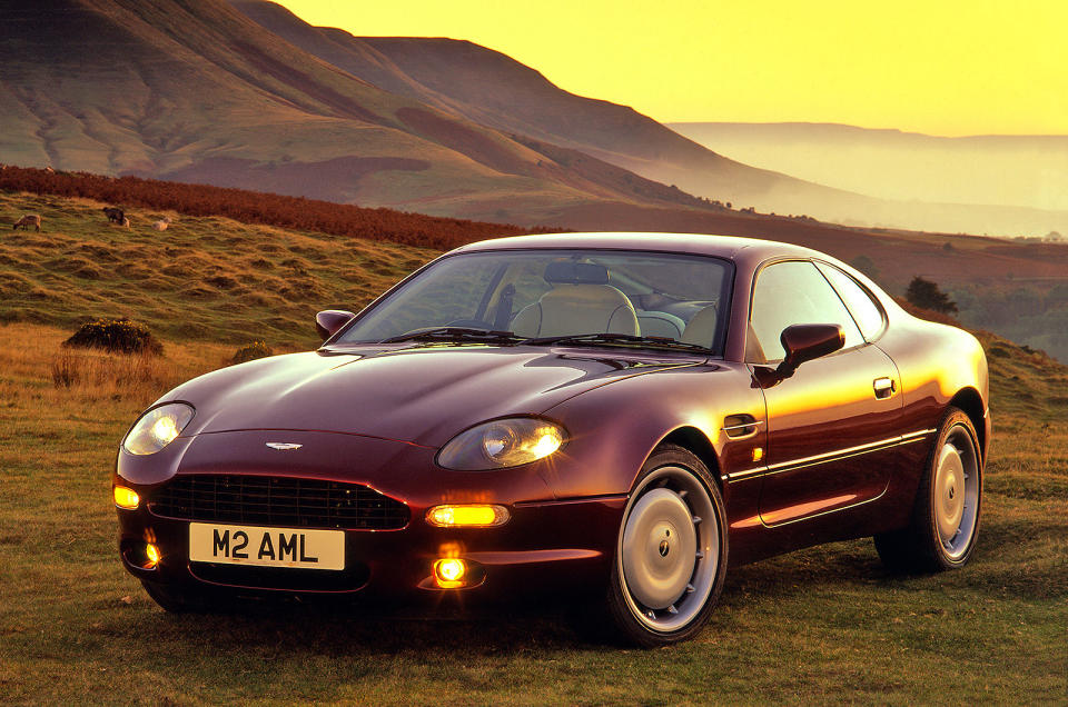 <p><span><span>Driven by anglophile </span><span>Henry Ford II</span><span> in one of his final decisions, Ford bought a majority stake in Aston Martin in 1987, and assumed complete ownership in 1993. In the latter year, Aston revealed its new DB7 to the public, heralding a new direction for the brand, and the car went on sale in 1994 as a coupe. A convertible, known as the </span><span>Volante</span><span>, was introduced two years later.</span></span></p><p><span><span>Through Ford’s ownership of Jaguar, the DB7 was initially powered by a </span><span>supercharged 335bhp 3.2-litre</span><span> version of the latter’s straight-six AJ6 engine. A new </span><span>420bhp 5.9-litre V12</span><span> (Aston’s first unit of this type) was added to the range in 1999.</span></span></p>