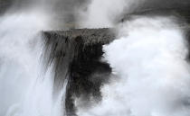 Huge waves break on the cliffs of the coast of Llanes, Spain, on Sunday after Storm Fabien moved across from the Atlantic. (Reuters)