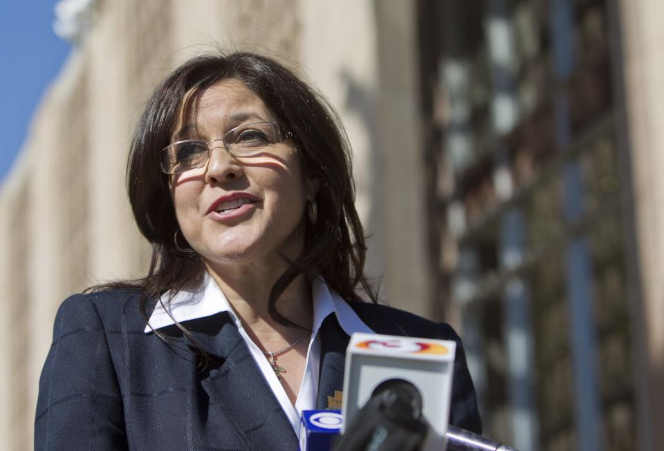 Sen. Catherine Miranda speaks with the media outside the Legislature.