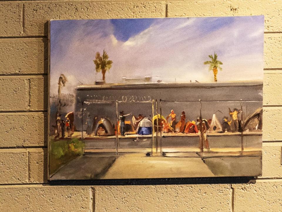 One of Joel Coplin's paintings is a real life scene of a homeless encampment outside his gallery and