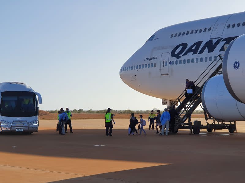 Australian evacuees from Wuhan, China arrive at RAAF base Learmonth in Western Australia on board a chartered Qantas plane prior to their quarantine at Christmas Island