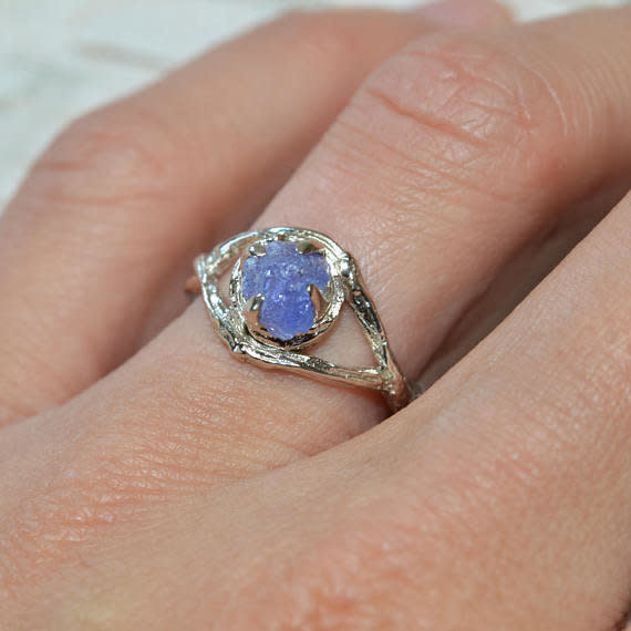 <i>Buy it from <a href="https://www.etsy.com/listing/483669264/raw-uncut-tanzanite-engagement-ring?ga_search_query=uncut&amp;ref=shop_items_search_1" target="_blank">OliviaEwingJewelry</a>&nbsp;via Etsy for&nbsp;$700+</i>