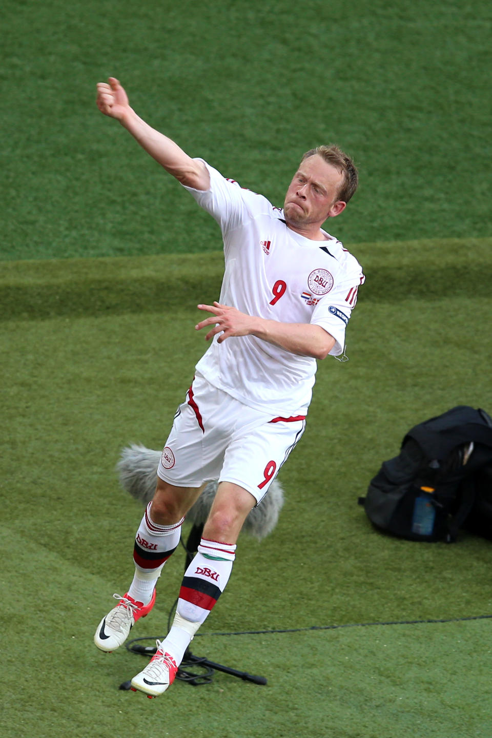 KHARKOV, UKRAINE - JUNE 09: Michael Krohn-Dehli of Denmark celebrates scoring their first goal during the UEFA EURO 2012 group B match between Netherlands and Denmark at Metalist Stadium on June 9, 2012 in Kharkov, Ukraine. (Photo by Julian Finney/Getty Images)