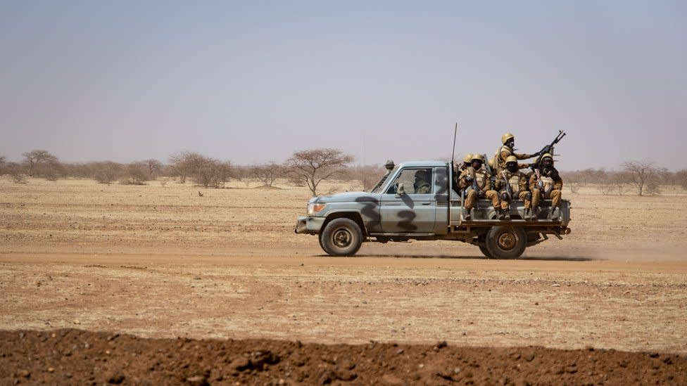 Burkina Faso soldiers aboard a pick-up truck in 2020