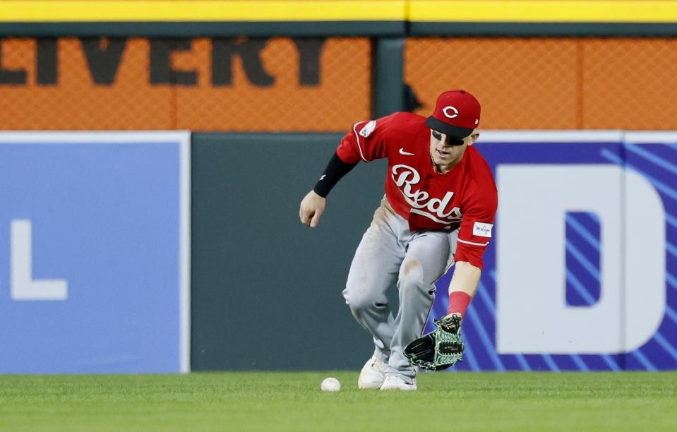 Cincinnati Reds center fielder Harrison Bader fields a single hit by Detroit Tigers' Spencer Torkelson during the fifth inning of a baseball game Wednesday, Sept. 13, 2023, in Detroit. (AP Photo/Duane Burleson)
