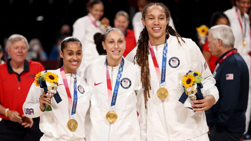 Griner (right), Taurasi (center) and Skylar Diggins celebrate winning gold at the Tokyo Olympics in 2021. - Kevin C. Cox/Getty Images