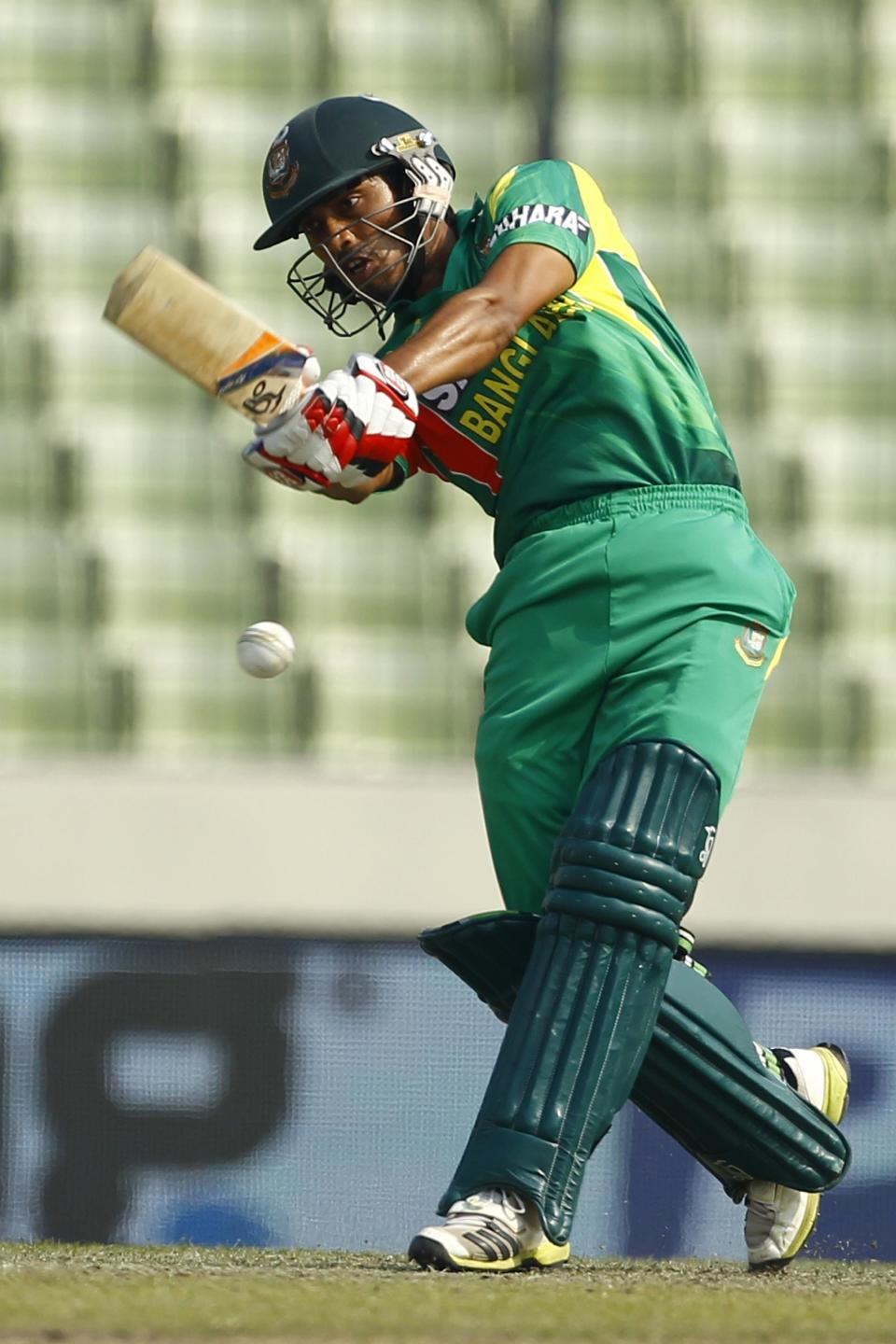 Bangladeshi cricket player Anamul Haque bats during the Asia Cup one-day international cricket tournament against Sri Lanka in Dhaka, Bangladesh, Thursday, March 6, 2014. (AP Photo/A.M. Ahad)