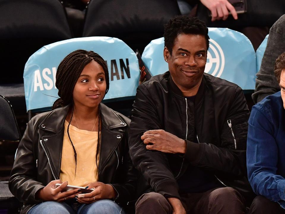 Lola Rock with Chris Rock at a basketball game