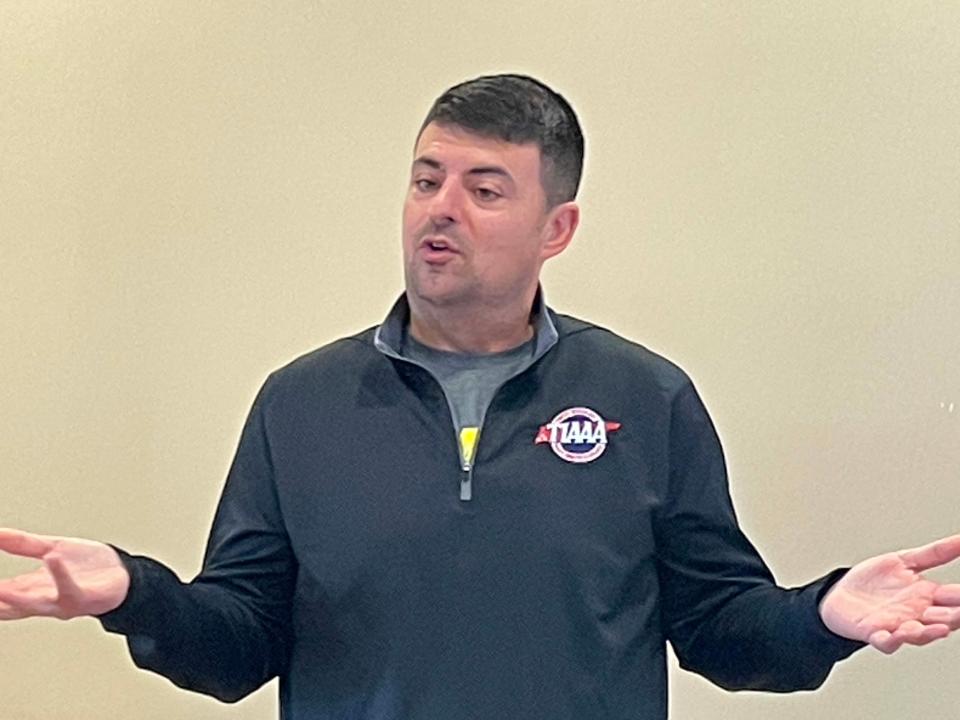 Karns High School Athletic Director Ben Collins asks attendees what they remember about the sports programs during the 1950s and 1960s at an open forum discussing the lost history of Karns High School at Karns Senior Center Nov. 20, 2023.