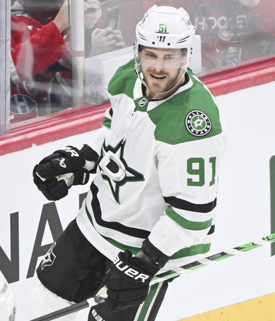 Dallas Stars' Tyler Seguin reacts after scoring against the Montreal Canadiens during third period NHL hockey action in Montreal, Canada, Saturday, Feb. 10, 2024. (Graham Hughes/The Canadian Press via AP)