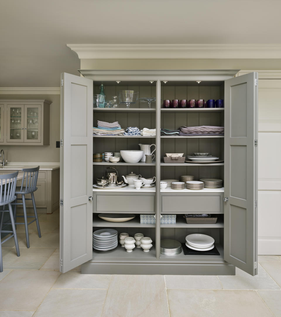 Design a floor-to ceiling, half-depth cabinet