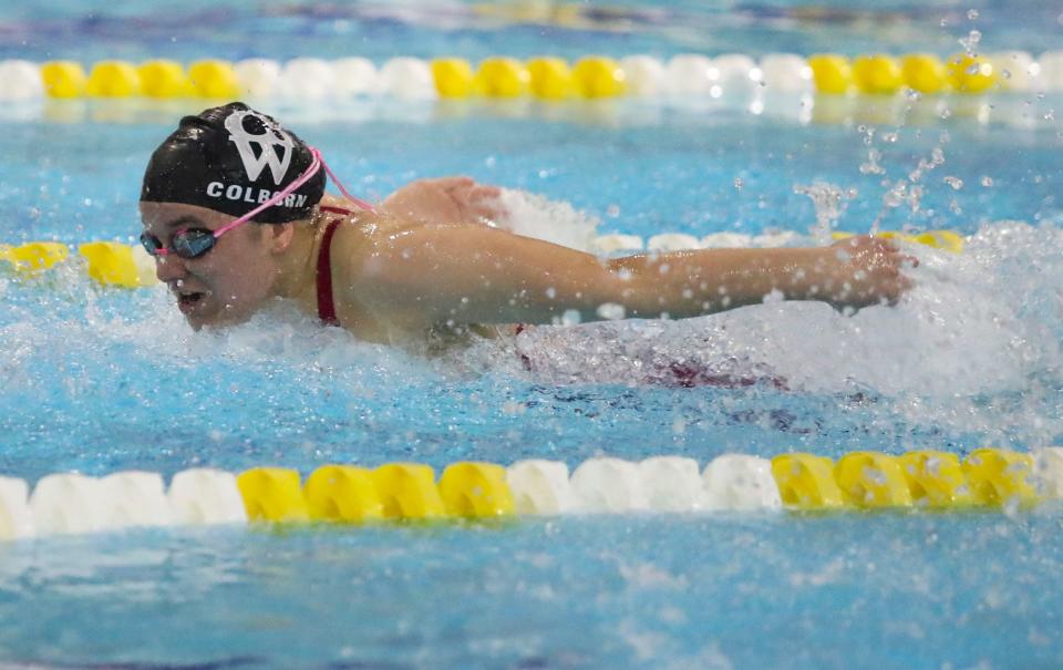 Charter School of Wilmington's Georgia Colborn wins the 100 yard butterfly during the DIAA girls swimming state championships at Rawstrom Natatorium at the University of Delaware, Saturday,Feb. 25, 2023.